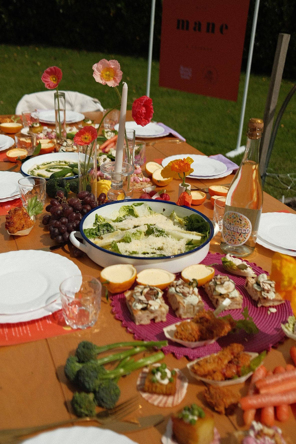 A Rose's Dining Table breakfast spread with focaccia, fresh fruit and flowers